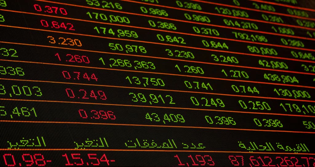 Should you invest in FTSE 100 stocks or gold